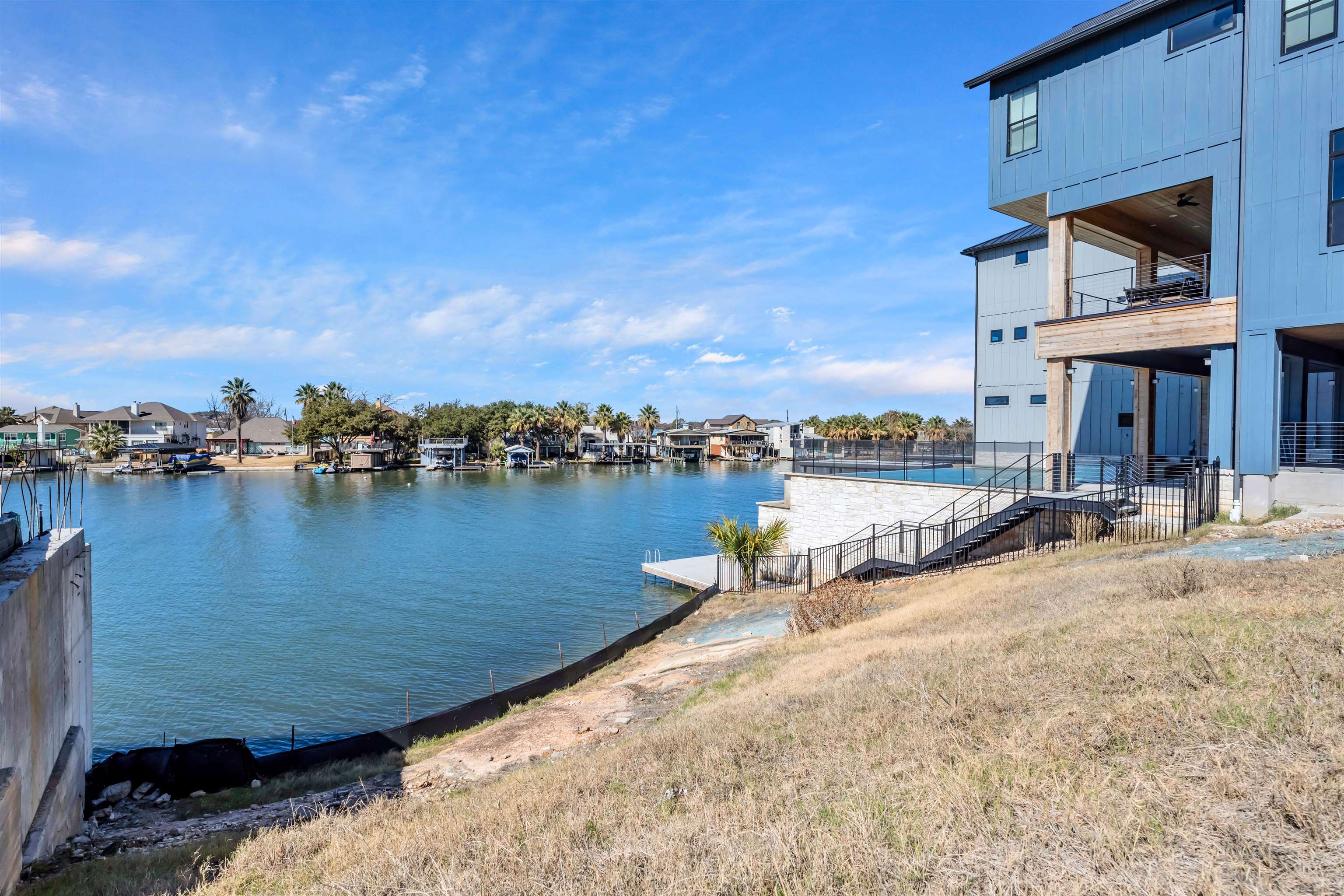 Lot 3 Pointe View Drive Granite Shoals, TX 78654 - Photo 2 of 5 a view of a lake with houses