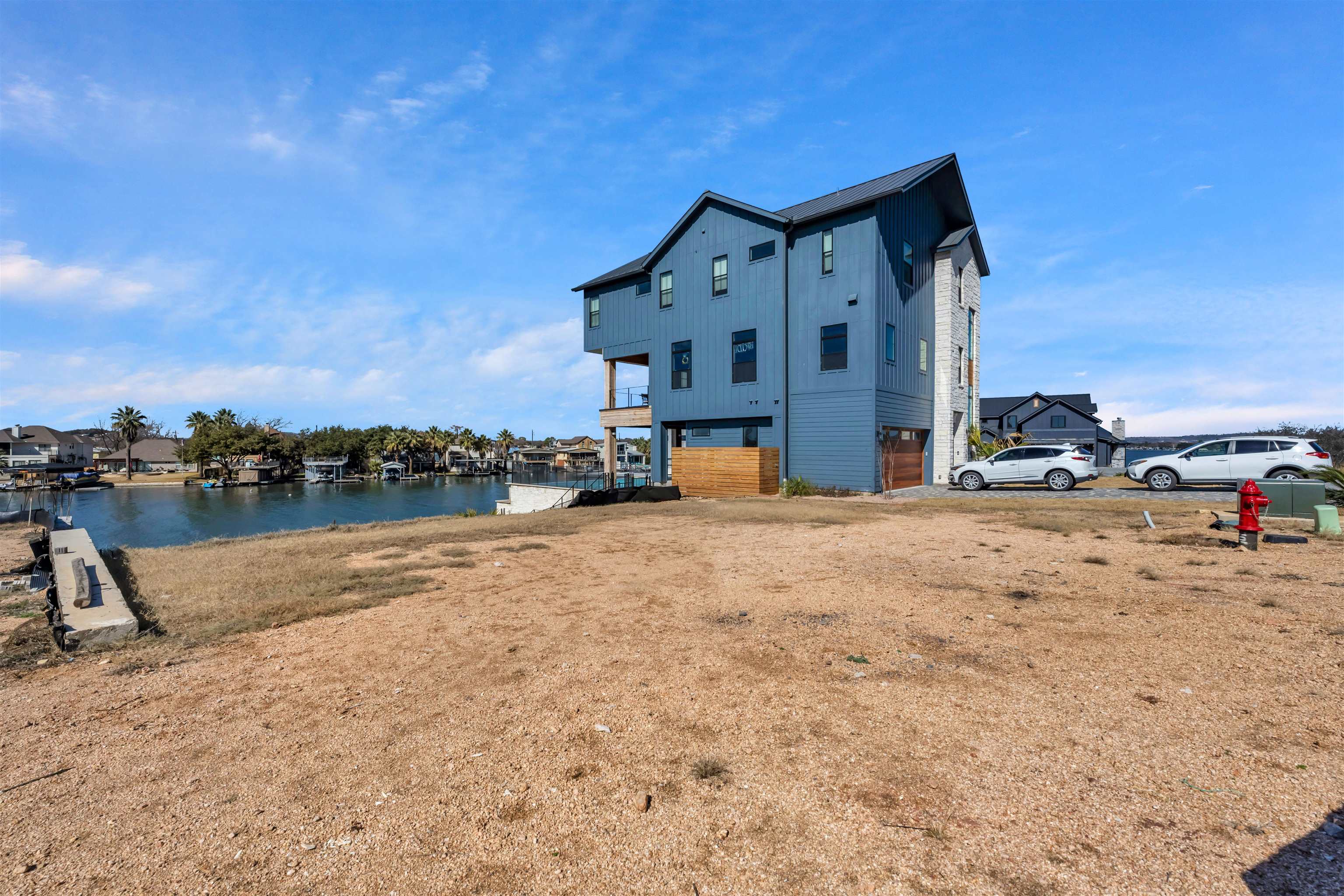 Lot 3 Pointe View Drive Granite Shoals, TX 78654 - Photo 3 of 5 a view of a house with a yard