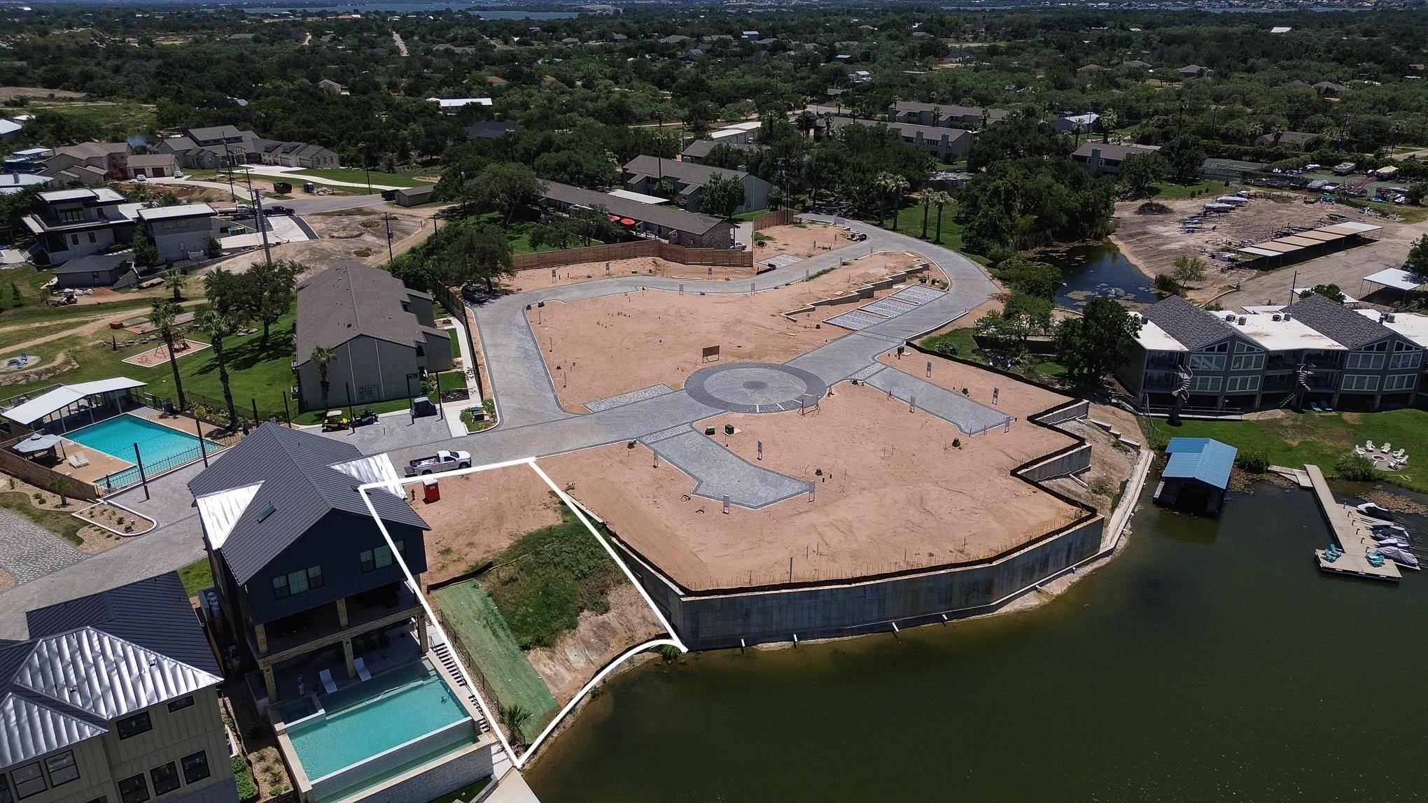 Lot 3 Pointe View Drive Granite Shoals, TX 78654 - Photo 5 of 5 an aerial view of a house with backyard space and river