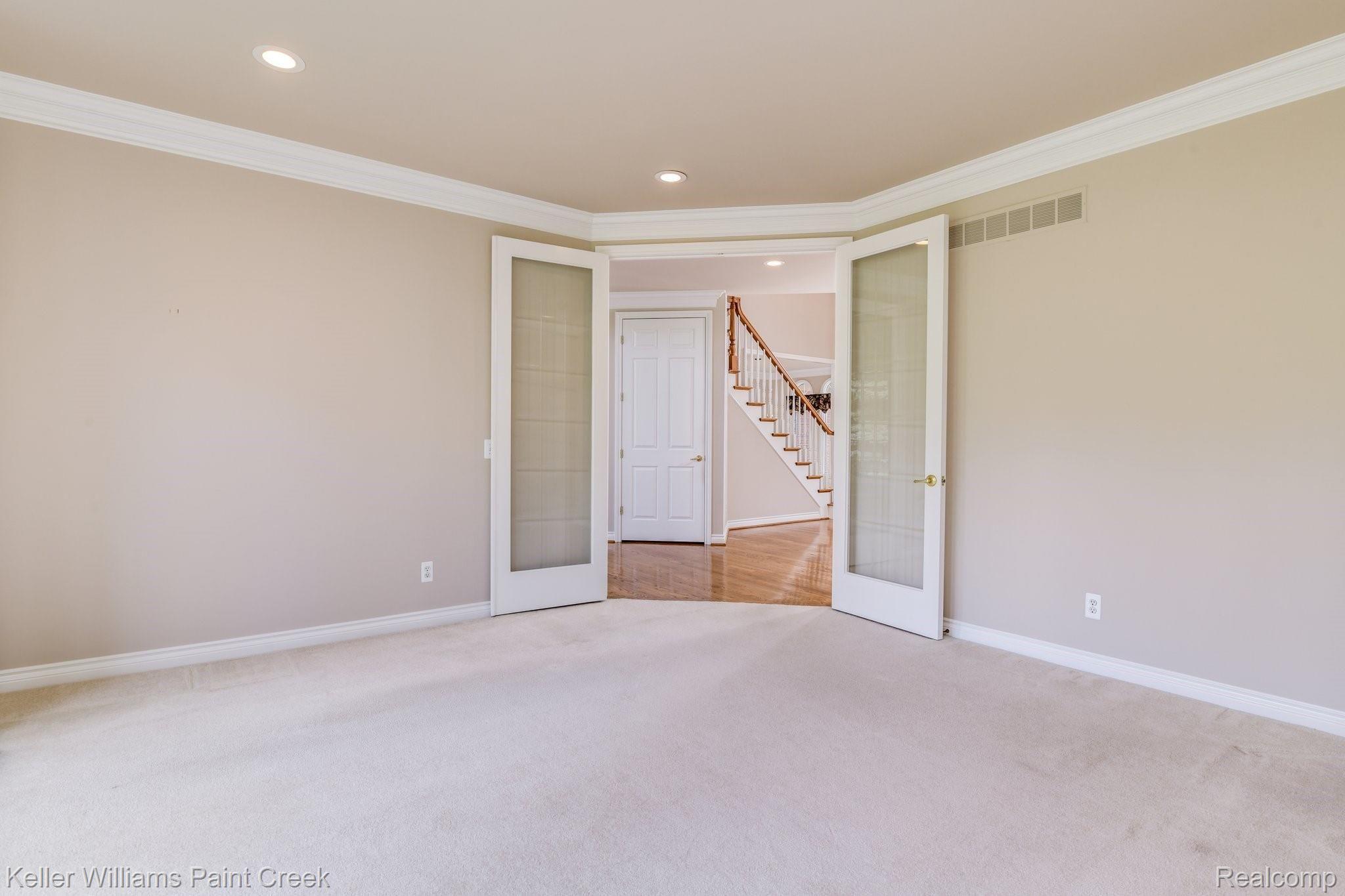 1163 Autumnview Drive Rochester, MI 48307 - Photo 5 of 34 Glass french doors for prime work/school from home privacy in the main floor office/den.