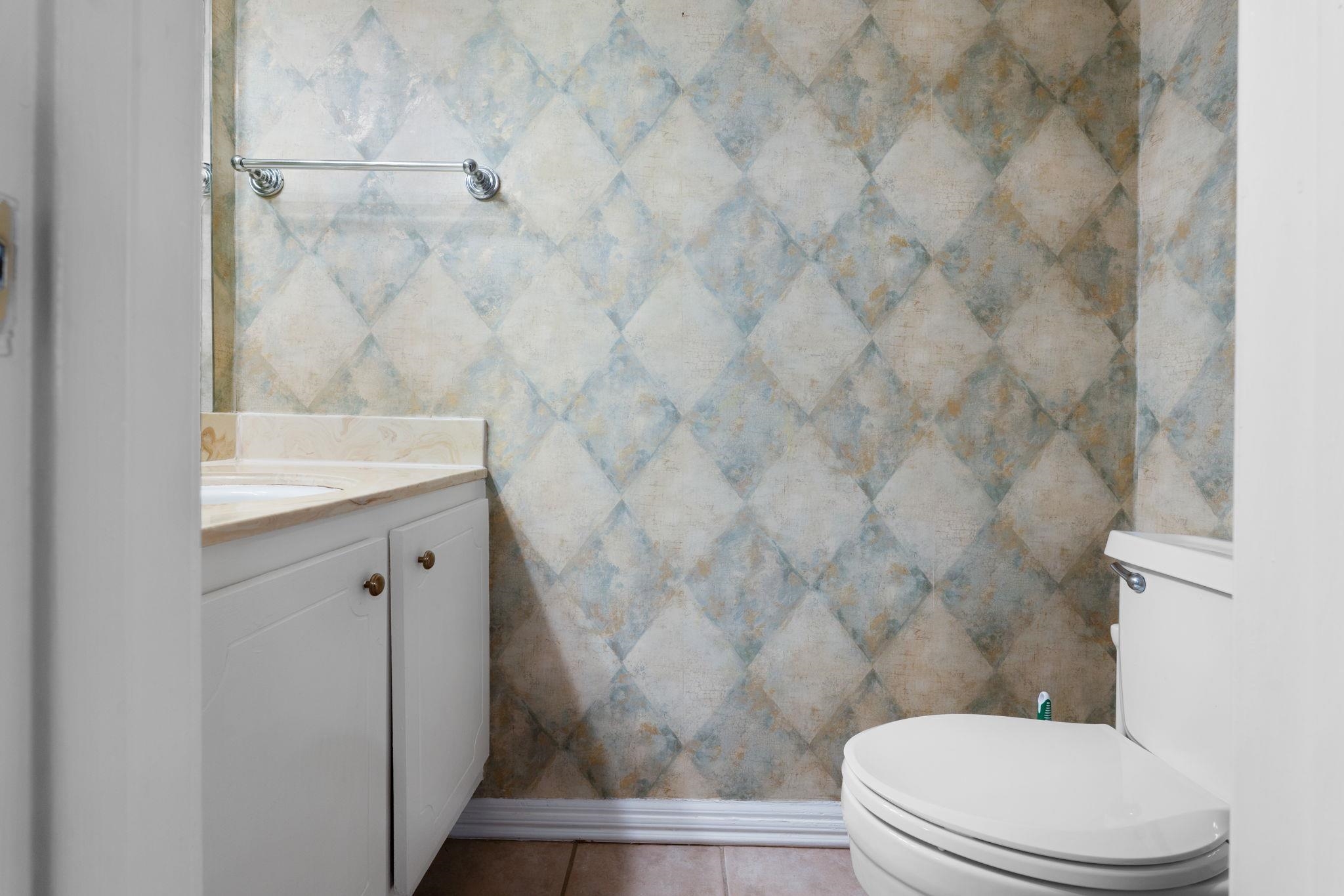 5726 Quince Road, Unit 9 Memphis, TN 38119 - Photo 13 of 21 Half bath featuring vanity and toilet