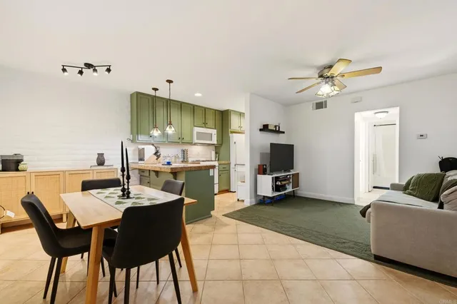 a view of kitchen with breakfast area