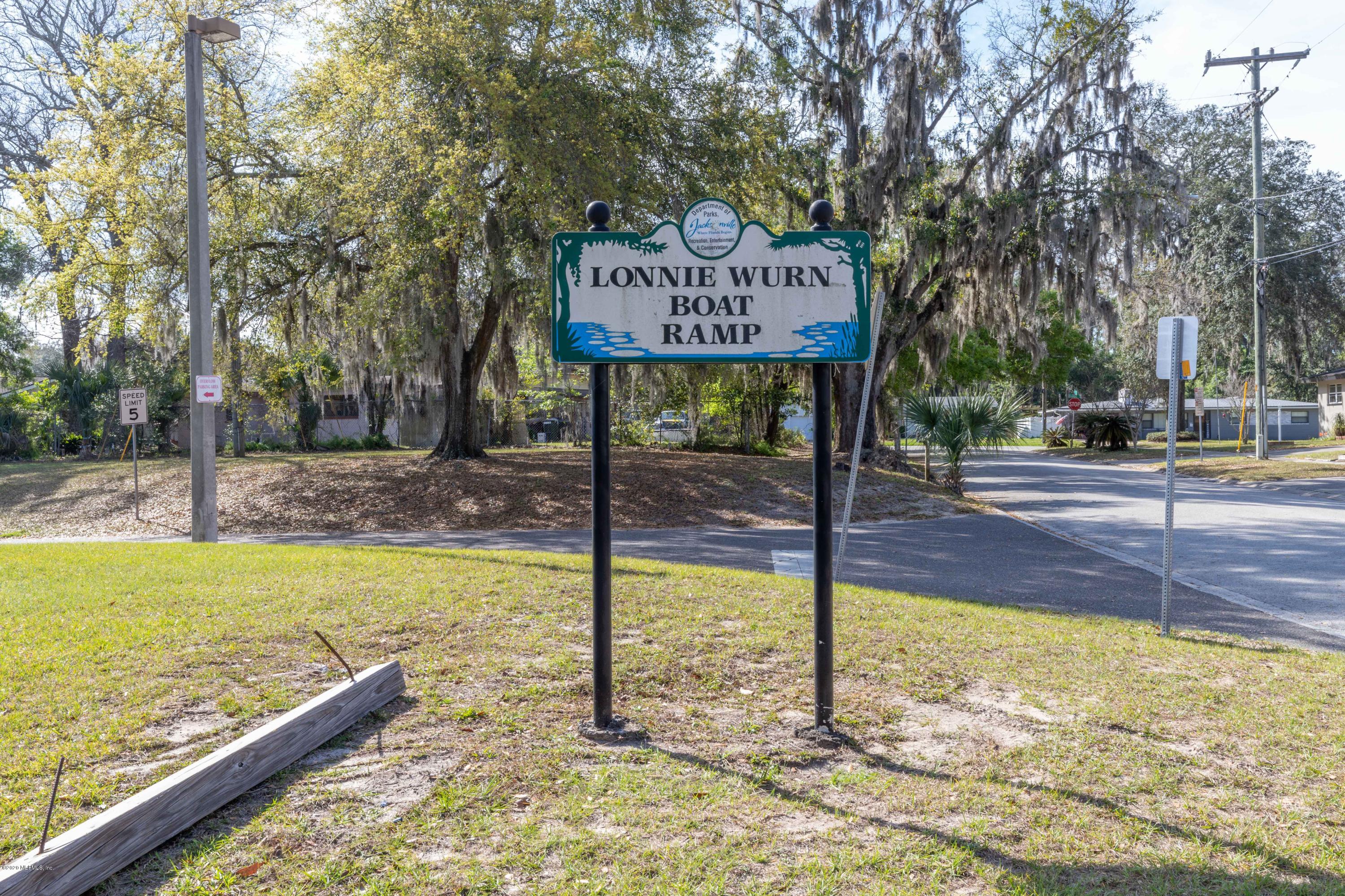 4124 Bess Road Jacksonville, FL 32277 - Photo 54 of 64 a sign that is on the side of a building