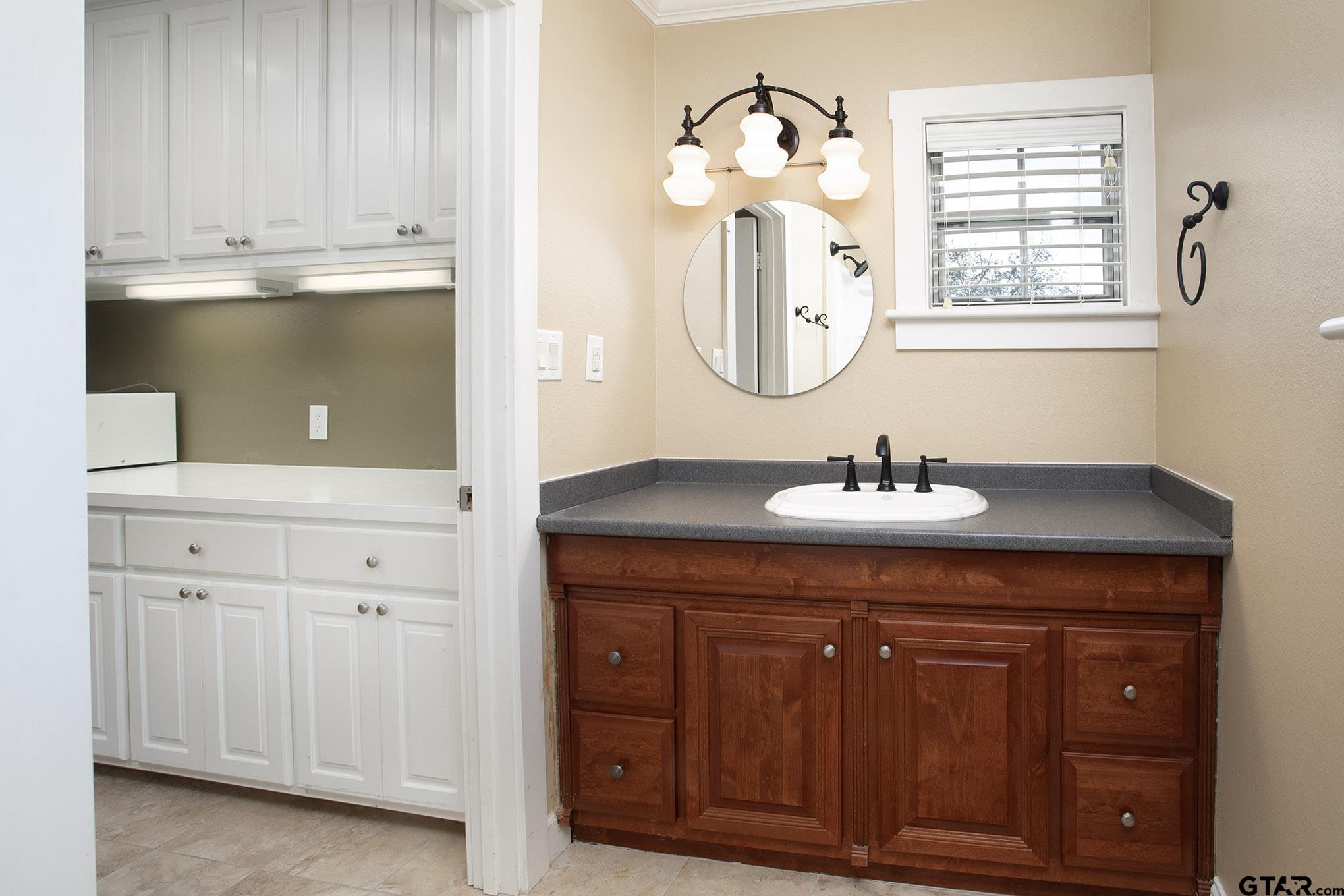 18722 Ridgeline Road Tyler, TX 75703 - Photo 30 of 47 Upstairs bathroom off of the media room.