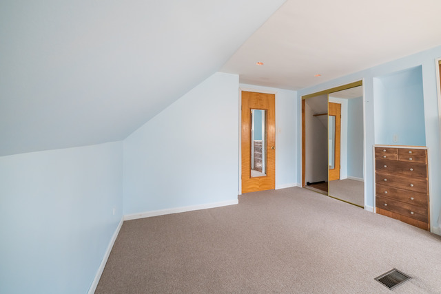 7609 Traube Street North Riverside, IL 60546 - Photo 22 of 25 a view of an empty room with window