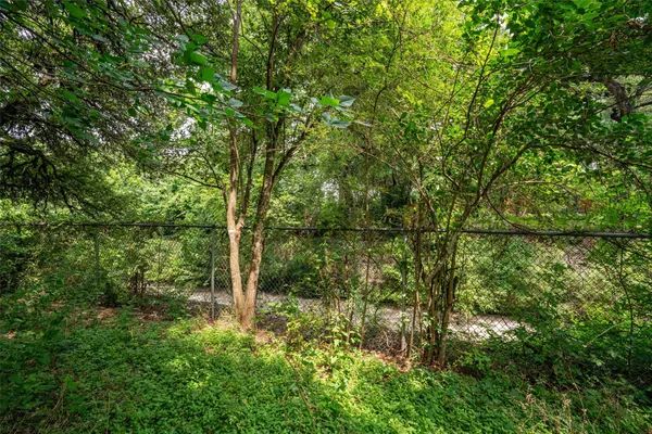 a view of outdoor space with deck and yard