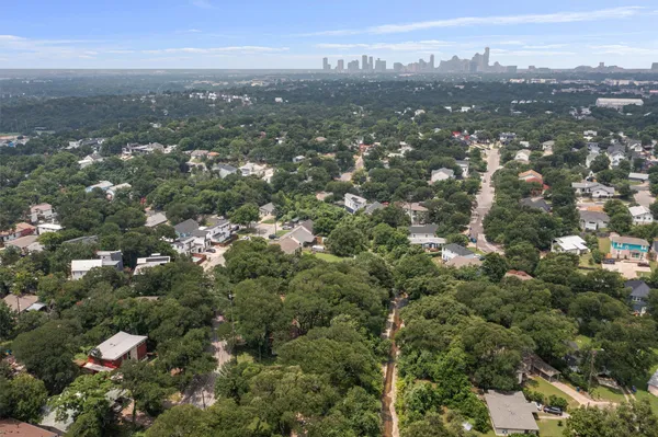 an aerial view of town with residential houses with city view
