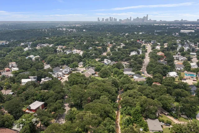 an aerial view of town with residential houses with city view