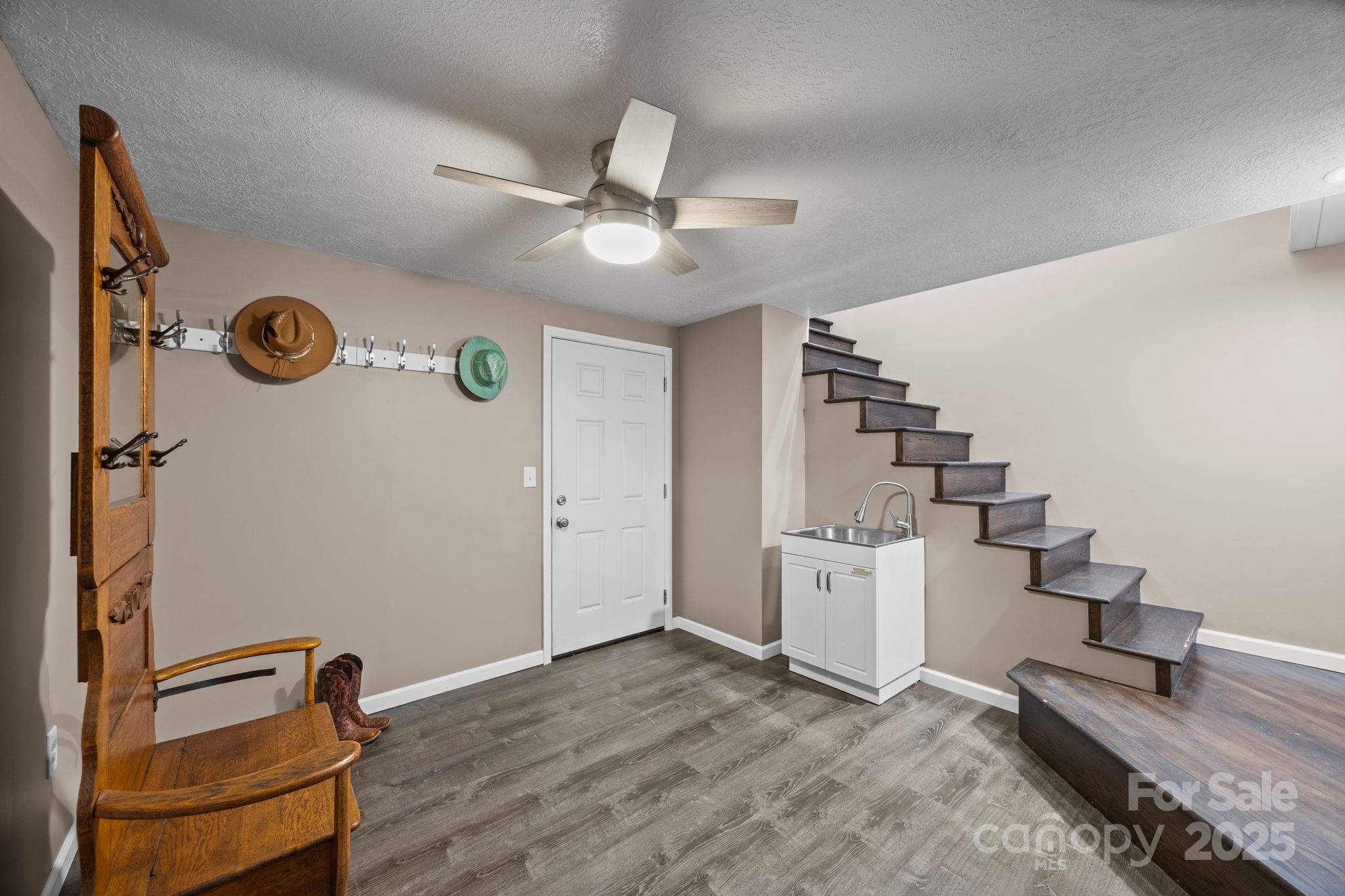 263 Morgan Branch Road Leicester, NC 28748 - Photo 31 of 31 a view of a workspace with furniture and a window