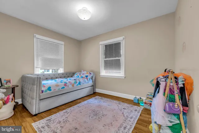 a bedroom with furniture and a couch