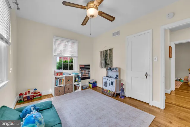 a bed room with a bed furniture and a window