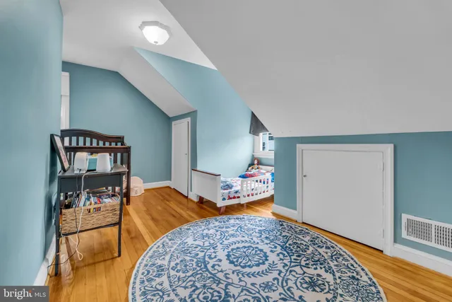 a view of a porch with wooden floor