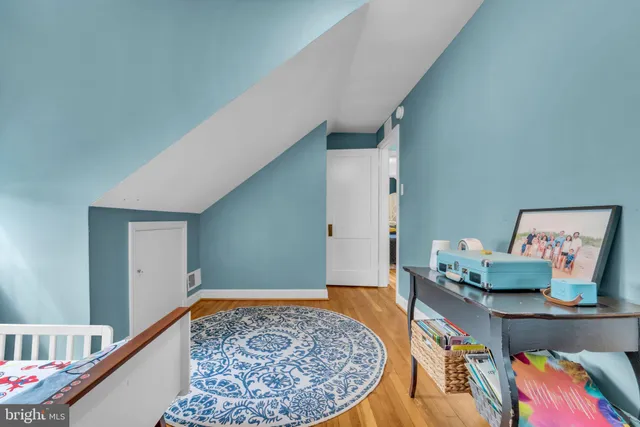 a workspace with furniture and wooden floor