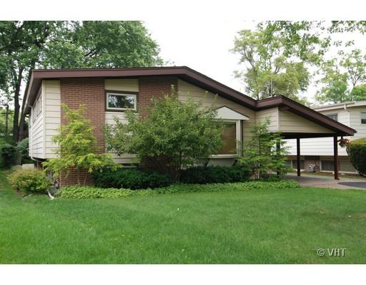 314 Voltz Road Northbrook, IL 60062 - Photo 1 of 1 a house with a tree in front of it