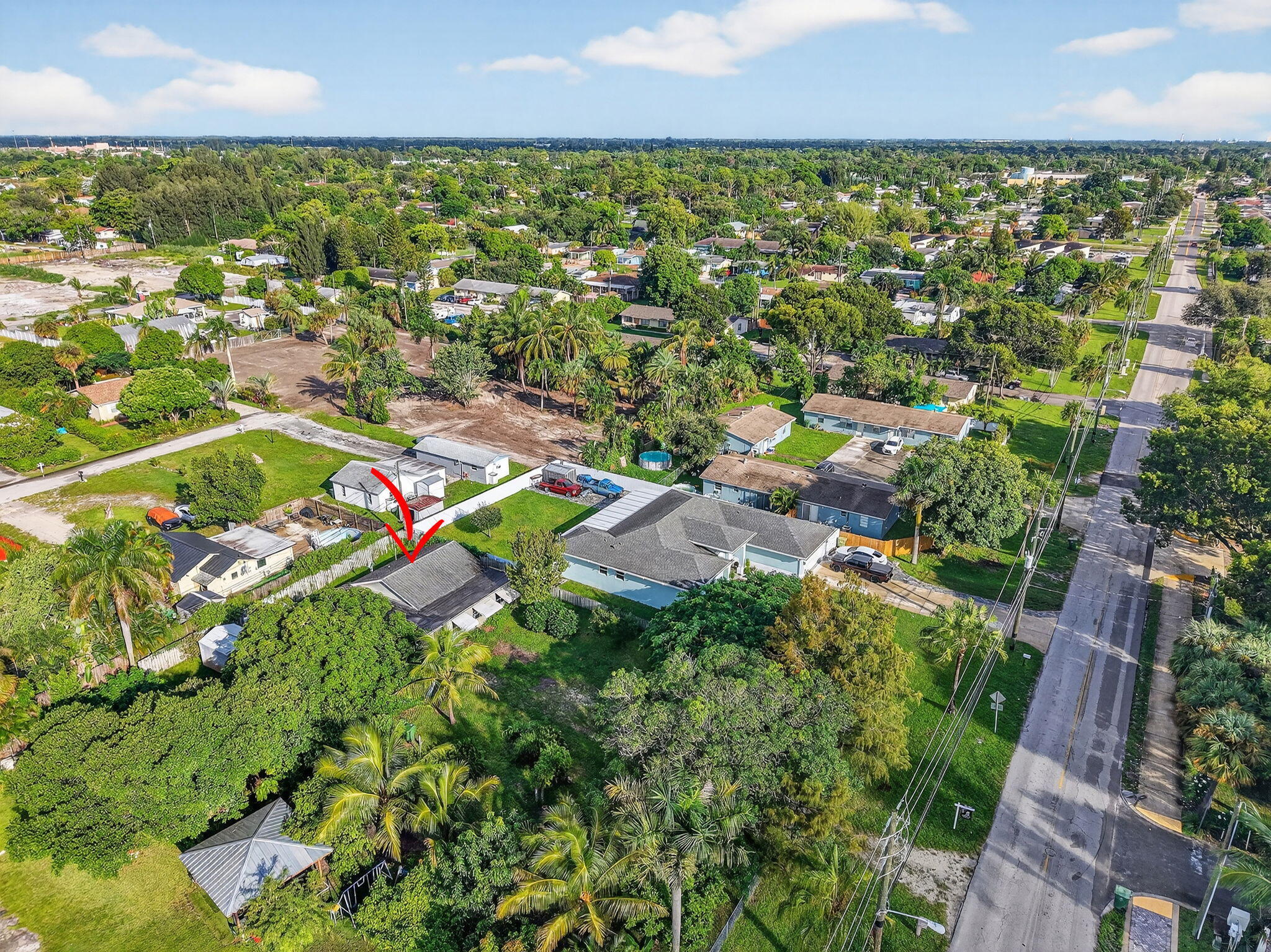 3582 Davis Road Palm Springs, FL 33461 - Photo 31 of 42 view of city with tall buildings