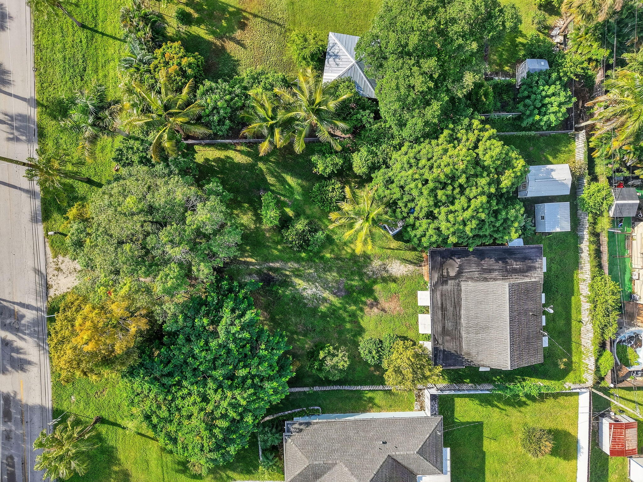 3582 Davis Road Palm Springs, FL 33461 - Photo 37 of 42 an aerial view of a house with a yard