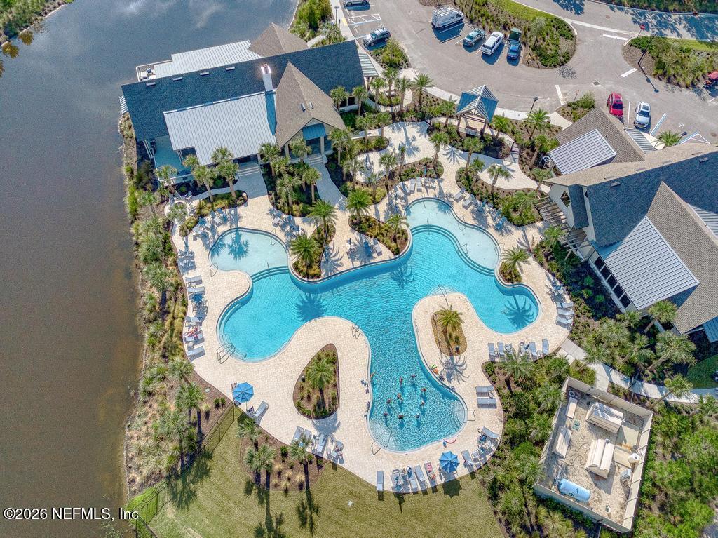 75268 Pondside Lane Yulee, FL 32097 - Photo 60 of 86 an aerial view of a house swimming pool and outdoor space