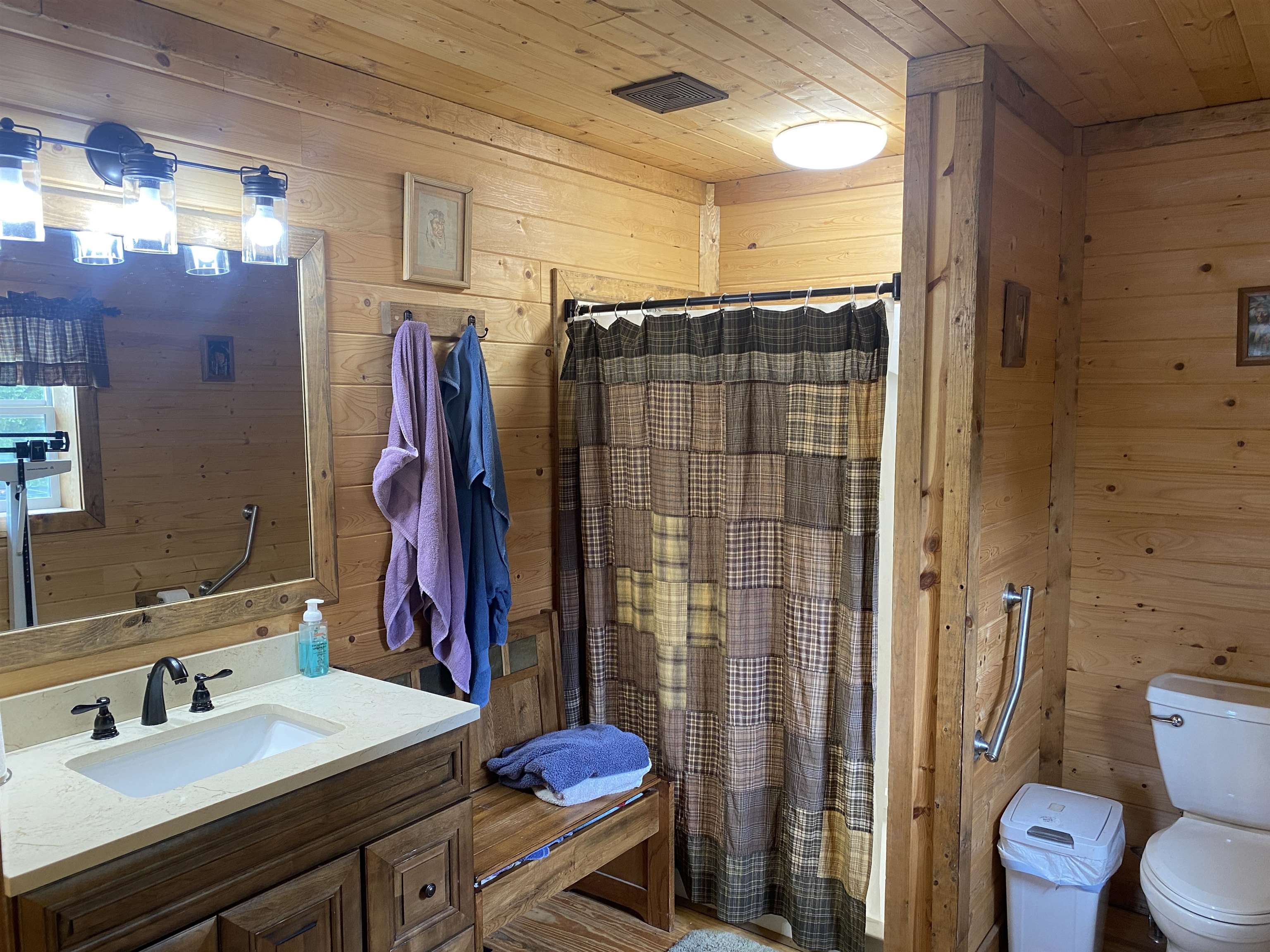 1120 Jot Em Down Road Morris Chapel, TN 38361 - Photo 11 of 40 a bathroom with a sink vanity granite toilet and shower