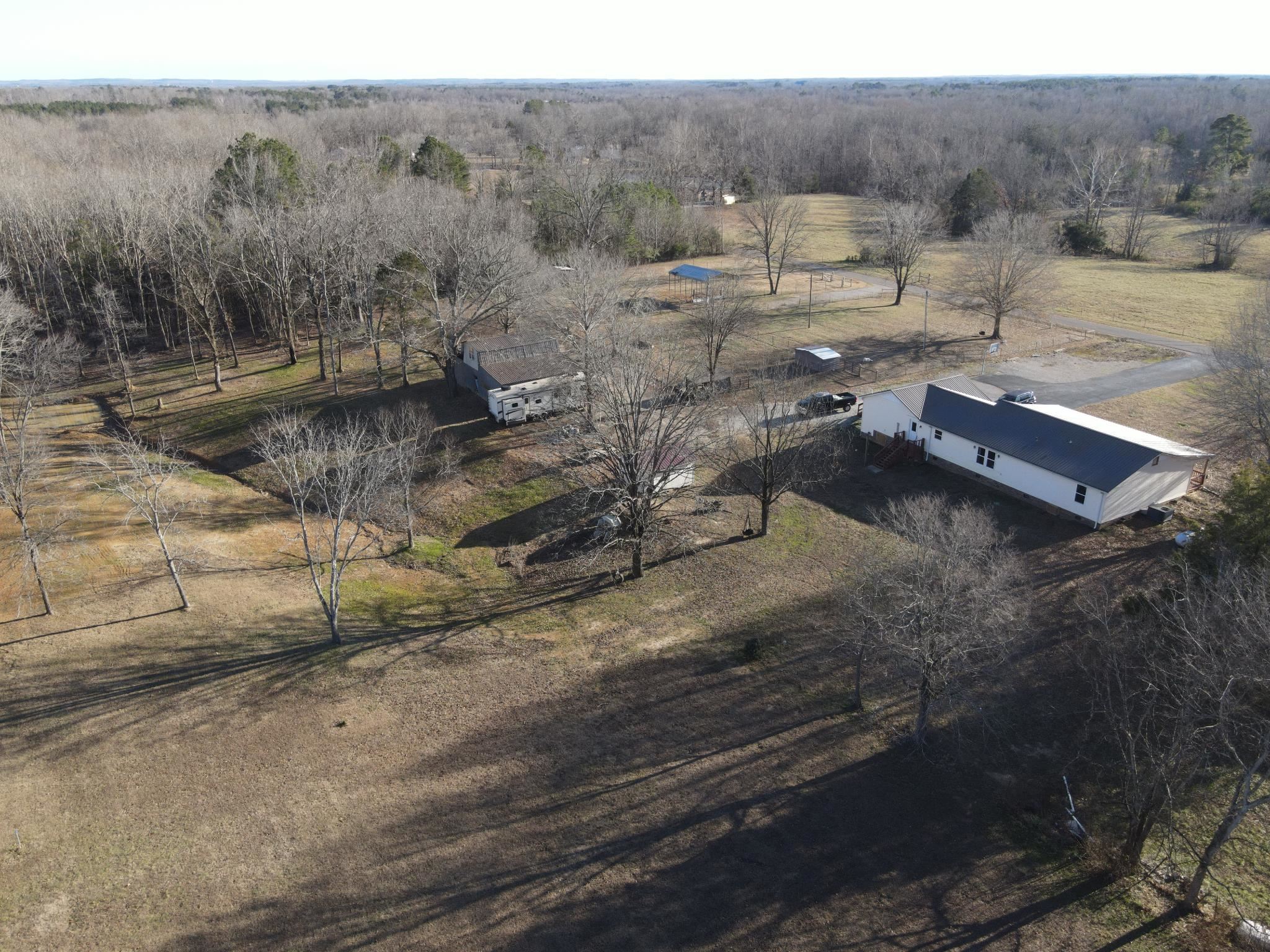 1120 Jot Em Down Road Morris Chapel, TN 38361 - Photo 24 of 40 a view of a town with large trees