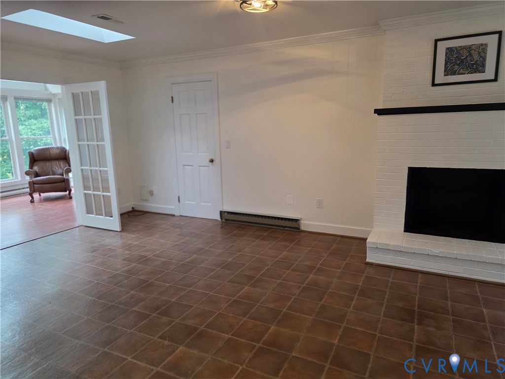 741 Furrs Mill Road Lexington, VA 24450 - Photo 12 of 29 Family Room w French Doors leading to 4-season Flo