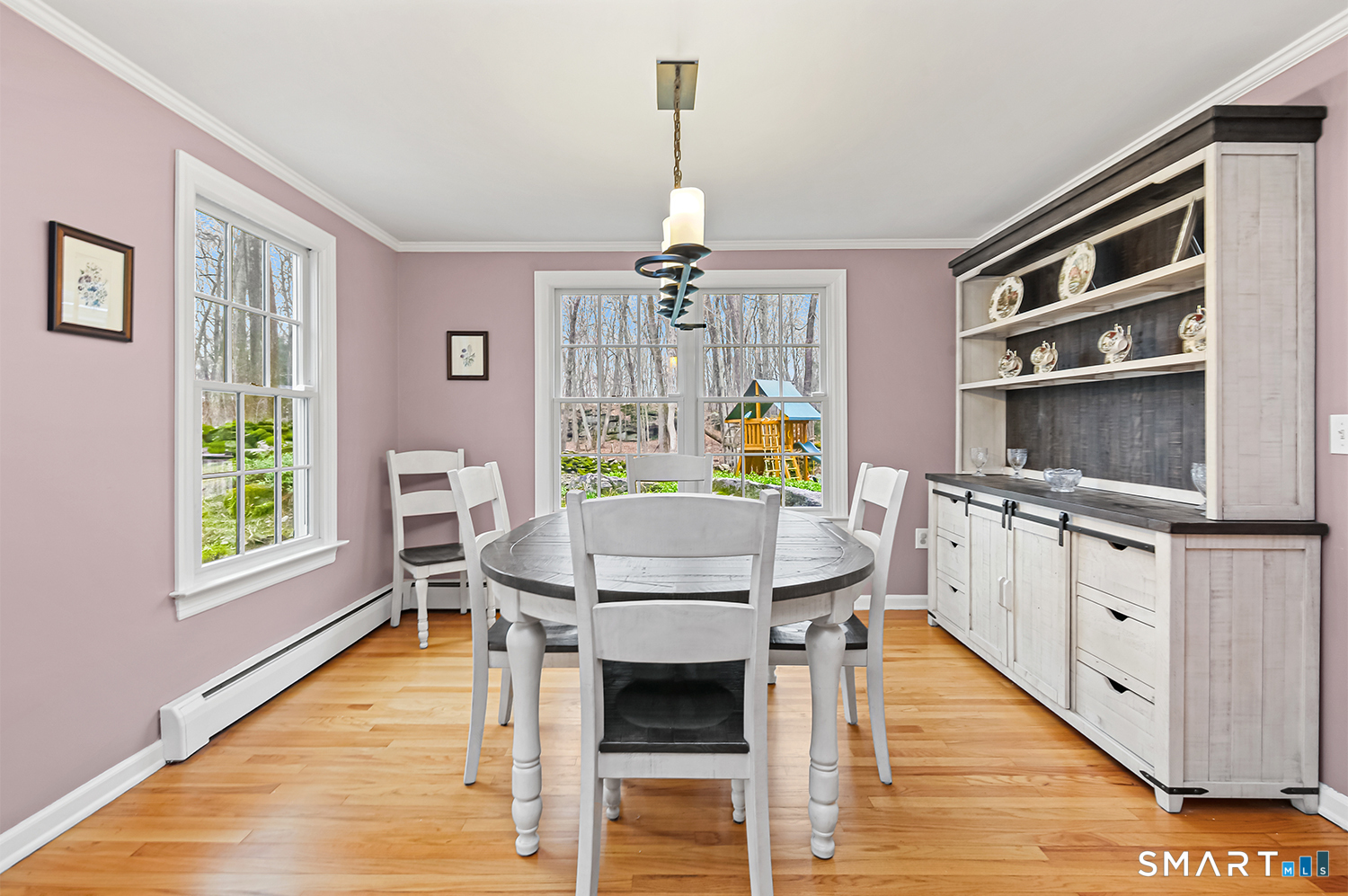 99 Chicken Street Wilton, CT 06897 - Photo 12 of 38 a living room with stainless steel appliances kitchen island granite countertop furniture and a wooden floor