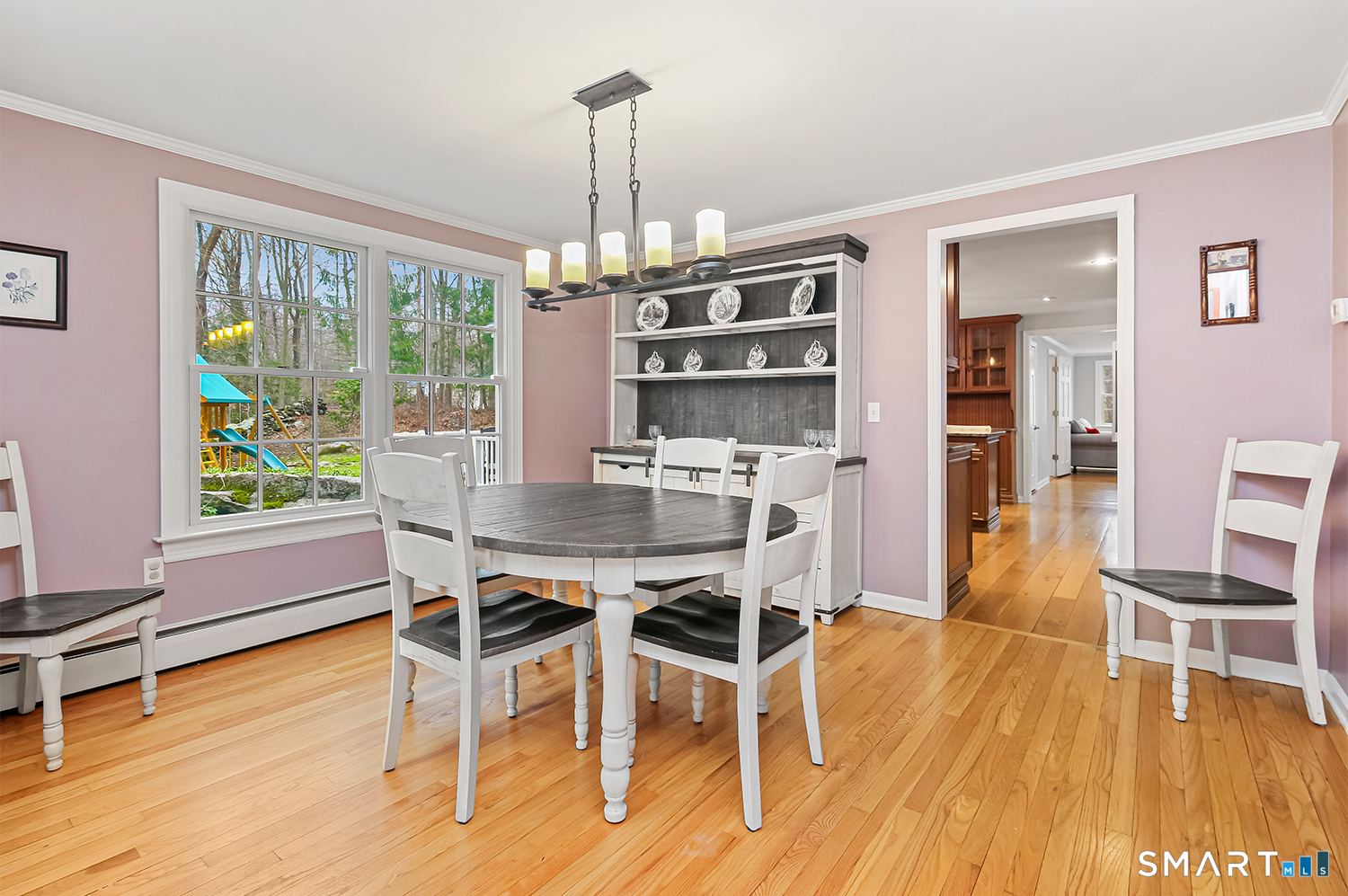 99 Chicken Street Wilton, CT 06897 - Photo 13 of 38 a dining room with furniture and wooden floor