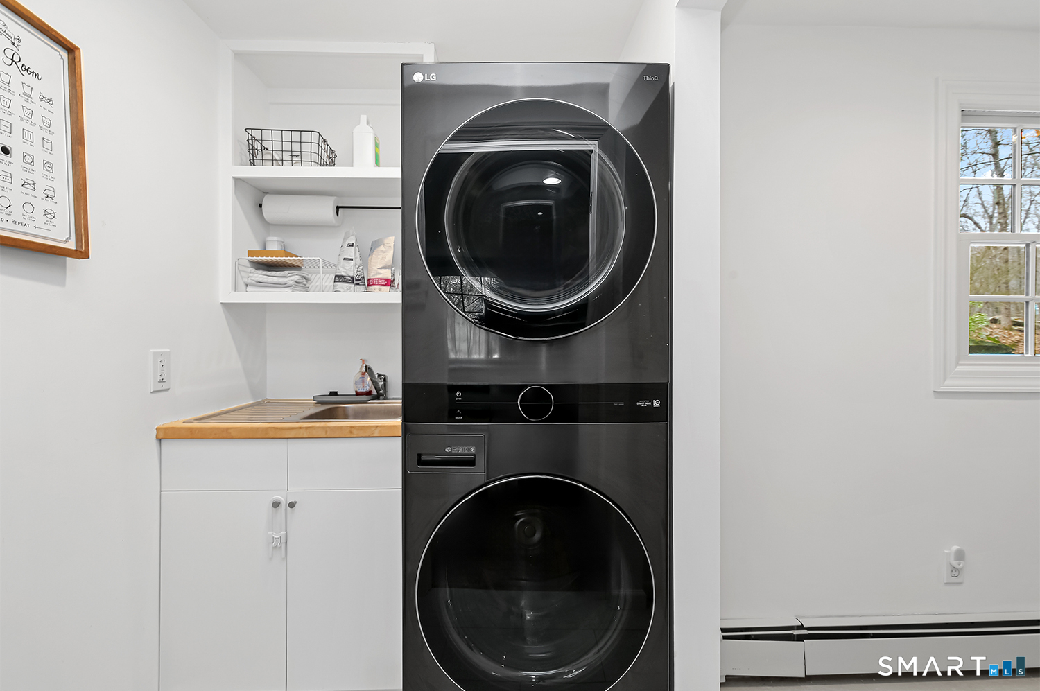 99 Chicken Street Wilton, CT 06897 - Photo 22 of 38 a utility room with dryer and washer