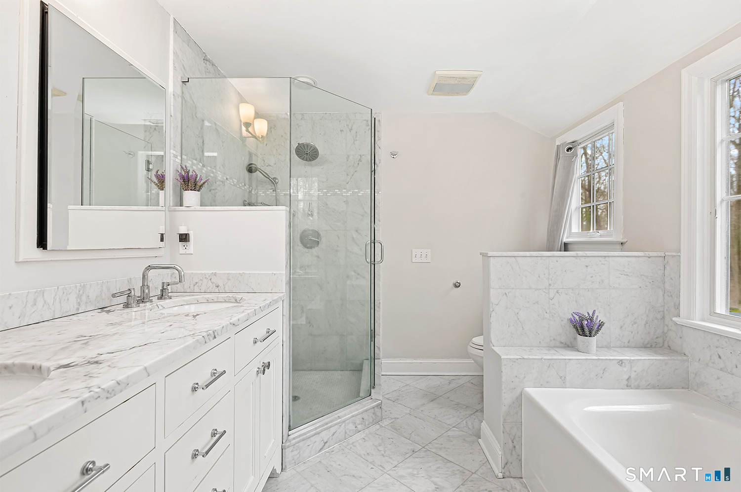 99 Chicken Street Wilton, CT 06897 - Photo 26 of 38 a bathroom with a granite countertop sink mirror and a bathtub