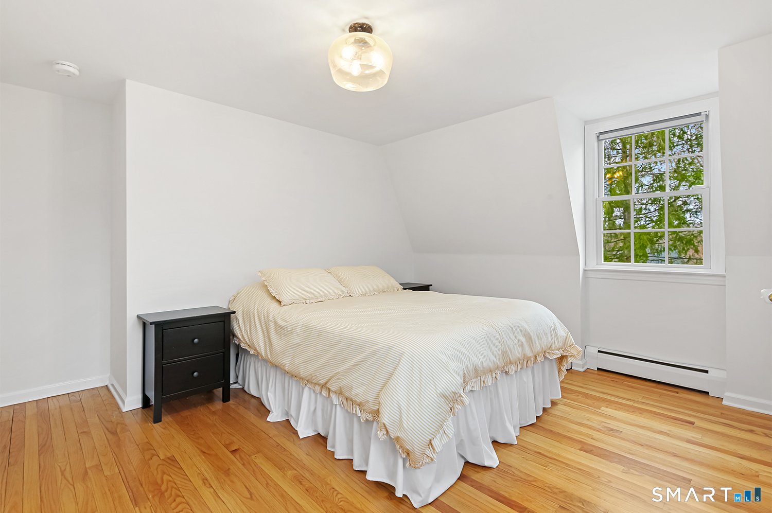 99 Chicken Street Wilton, CT 06897 - Photo 29 of 38 a bed room with a bed and a window