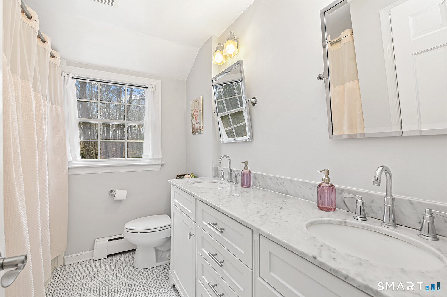 99 Chicken Street Wilton, CT 06897 - Photo 30 of 38 a bathroom with a granite countertop toilet sink and mirror