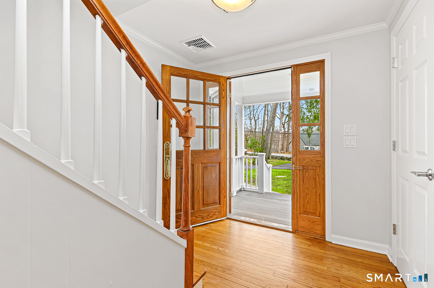 99 Chicken Street Wilton, CT 06897 - Photo 3 of 38 a view of an entryway with wooden floor