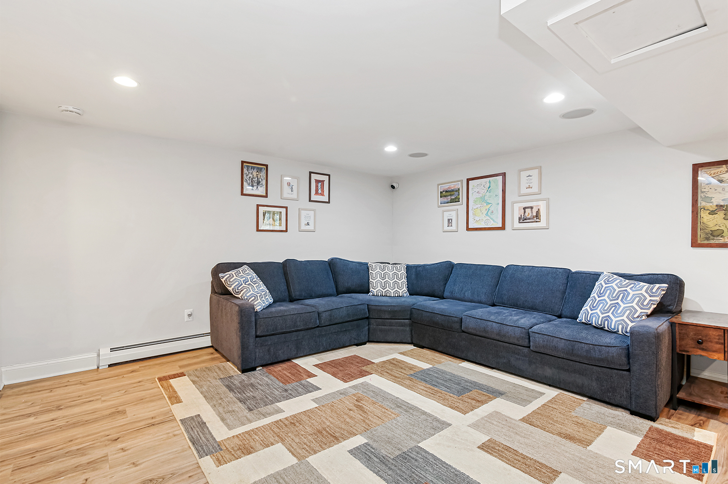99 Chicken Street Wilton, CT 06897 - Photo 32 of 38 a living room with furniture and a couch