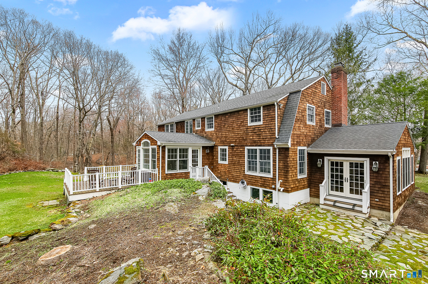 99 Chicken Street Wilton, CT 06897 - Photo 35 of 38 front view of a house with a yard