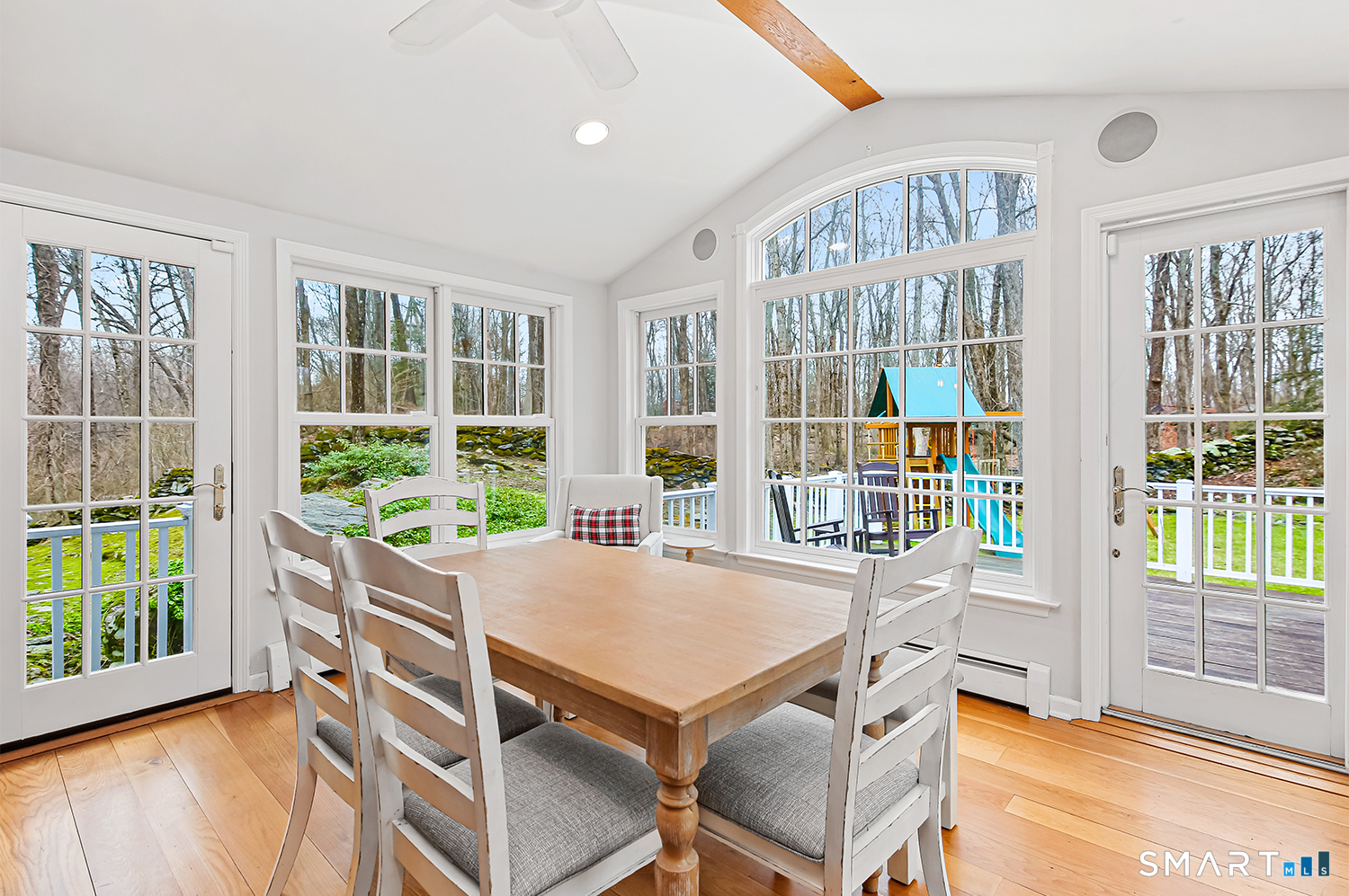 99 Chicken Street Wilton, CT 06897 - Photo 10 of 38 a view of a dining room with furniture window and outside view