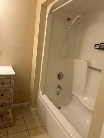 a view of a bathtub in a bathroom