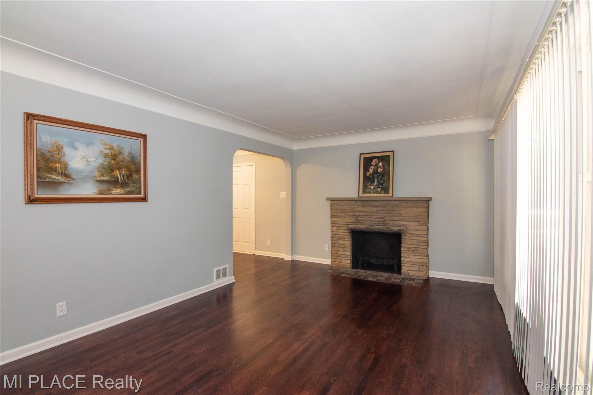 22330 Berg Road Southfield, MI 48033 - Photo 13 of 32 Living room with gas fireplace