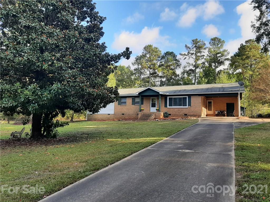 517 Rutledge Drive Catawba, SC 29704 - Photo 1 of 20 a front view of a house with garden