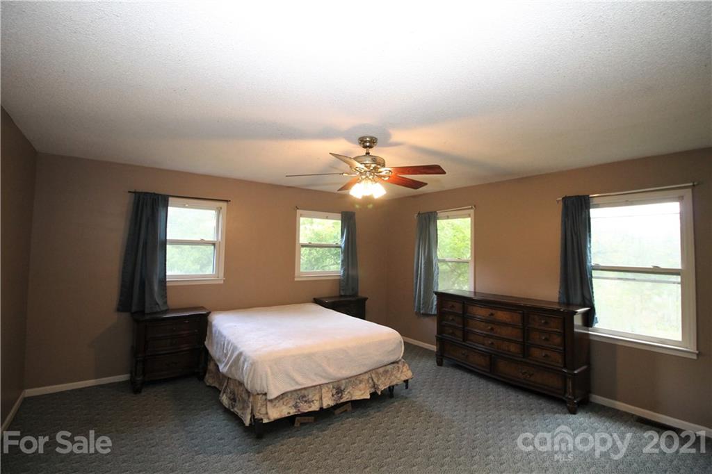 517 Rutledge Drive Catawba, SC 29704 - Photo 12 of 20 a spacious bedroom with a bed and a window