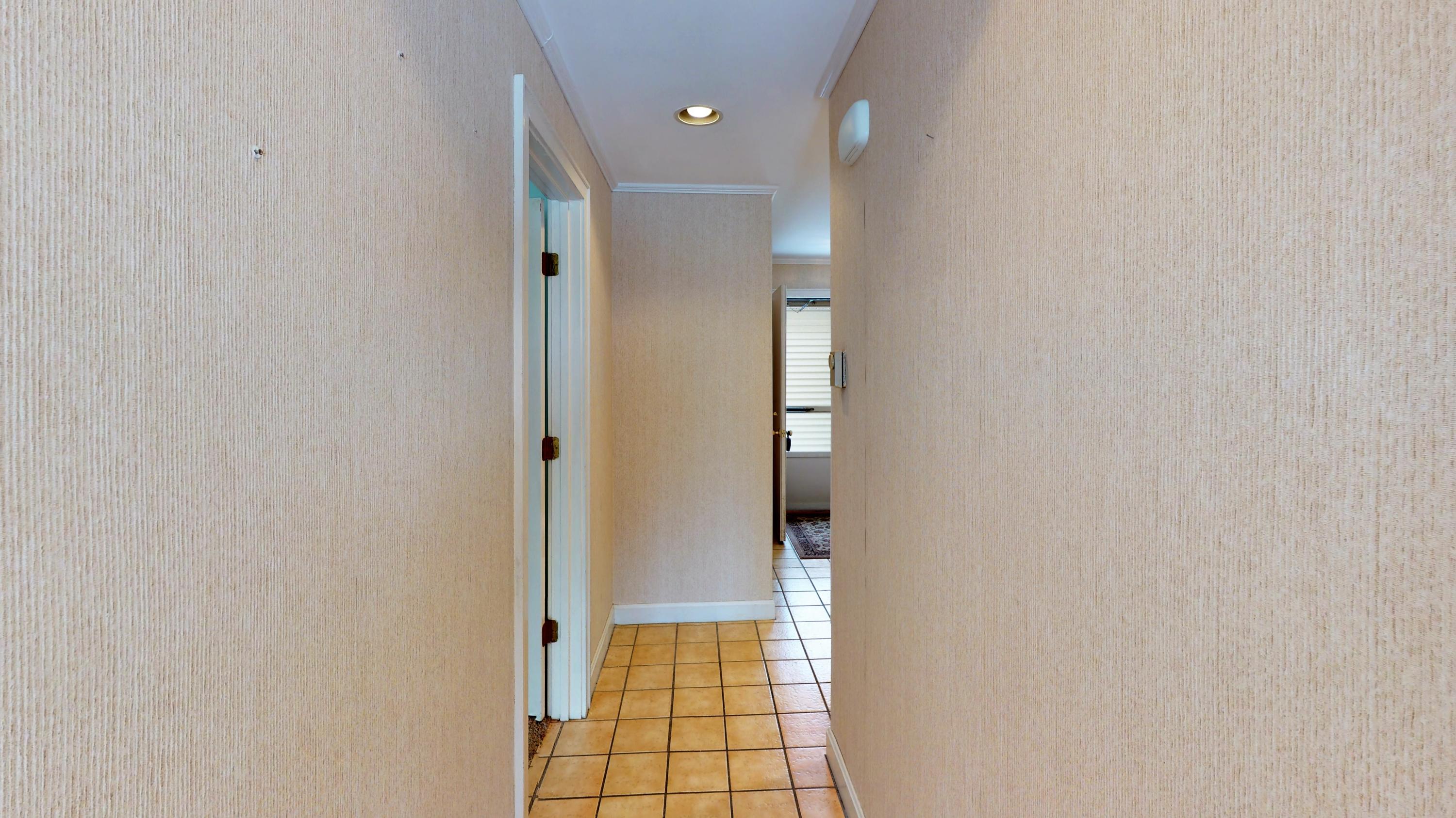 241 Sea Road, Unit 9 Kennebunk, ME 04043 - Photo 18 of 40 Hallway to Back Door