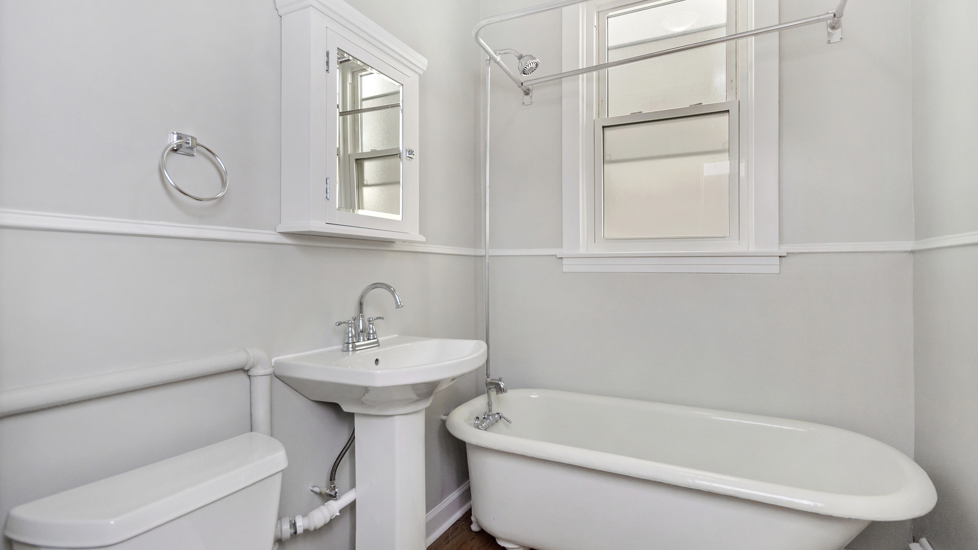 2905 North Burling Street, Unit 2 Chicago, IL 60657 - Photo 14 of 17 a white bath tub sitting next to a white sink