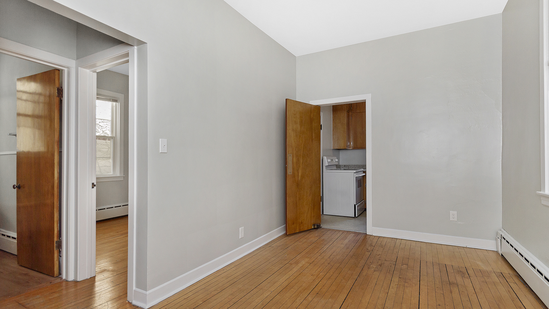 2905 North Burling Street, Unit 2 Chicago, IL 60657 - Photo 7 of 17 a view of empty room with wooden floor and wooden floor
