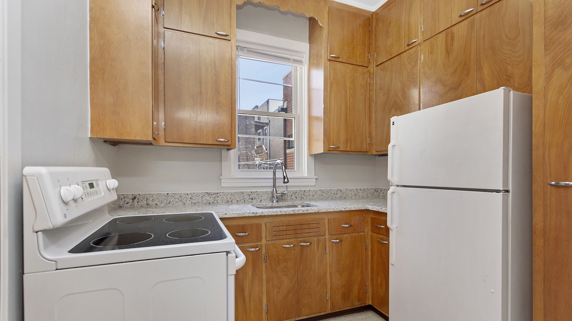 2905 North Burling Street, Unit 2 Chicago, IL 60657 - Photo 10 of 17 a utility room with dryer and washer