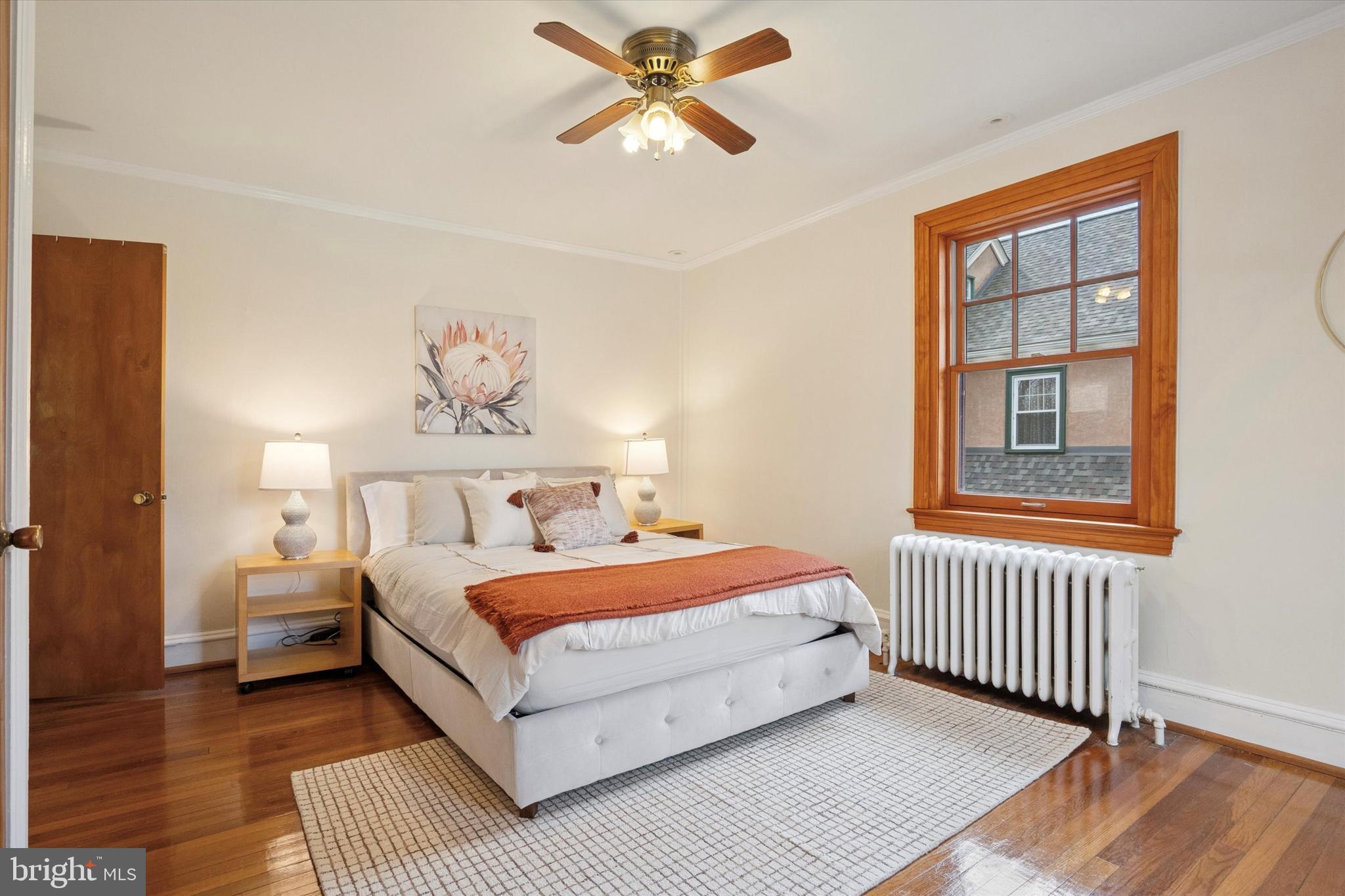 228 Avon Road Narberth, PA 19072 - Photo 15 of 24 a bedroom with a bed and a window
