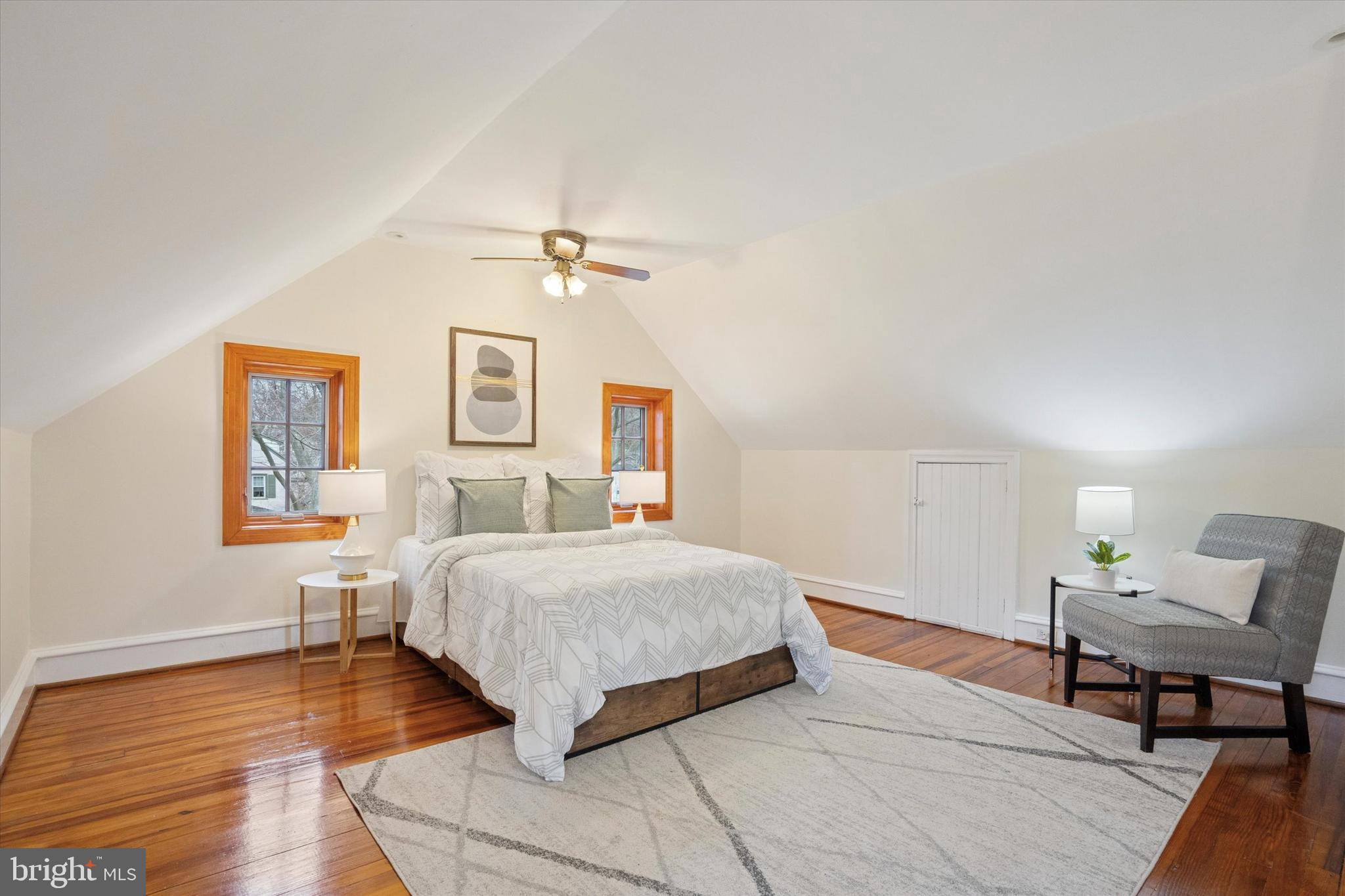 228 Avon Road Narberth, PA 19072 - Photo 19 of 24 a bedroom with a bed and wooden floor