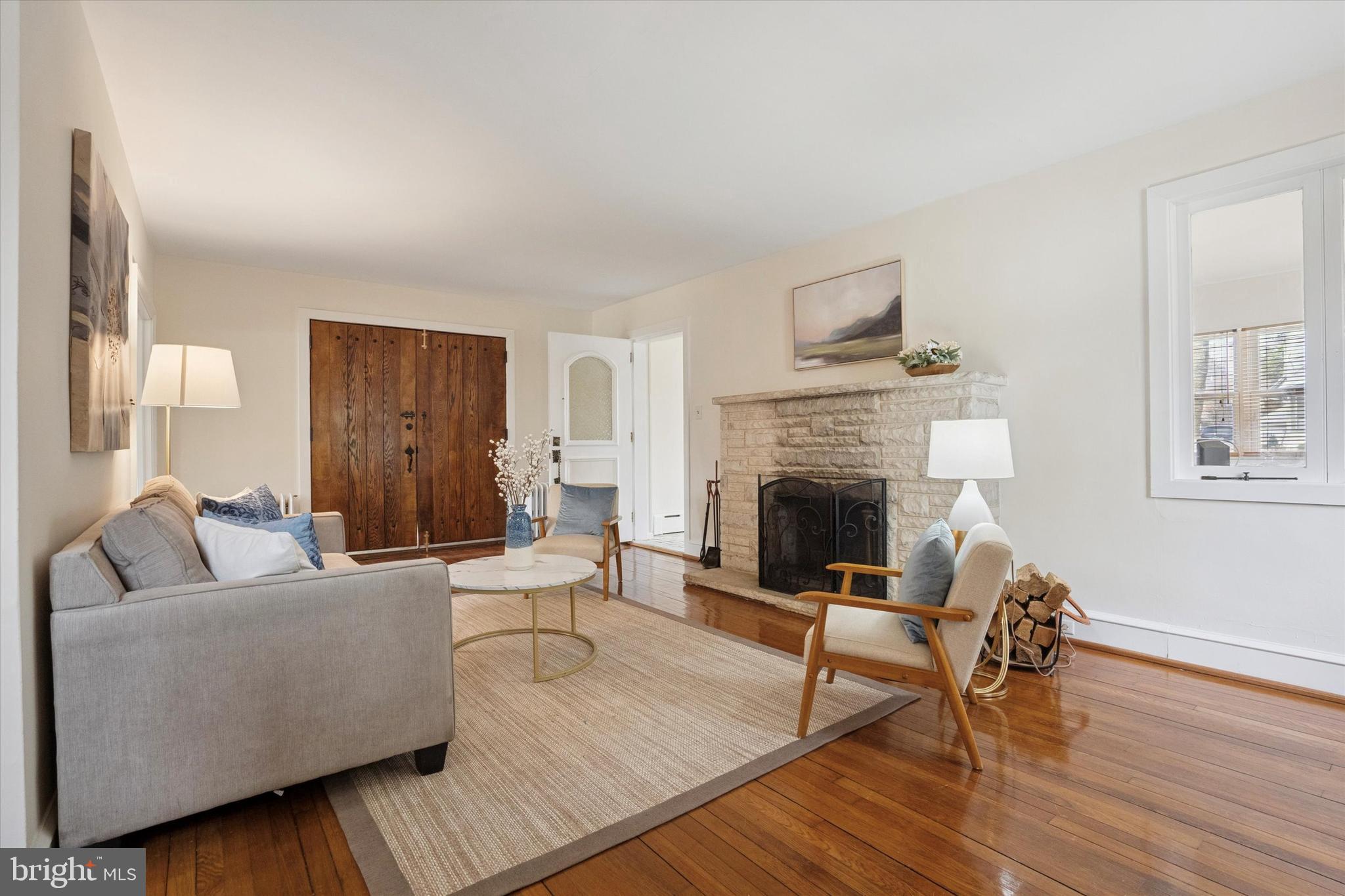 228 Avon Road Narberth, PA 19072 - Photo 5 of 24 a living room with furniture and a fireplace