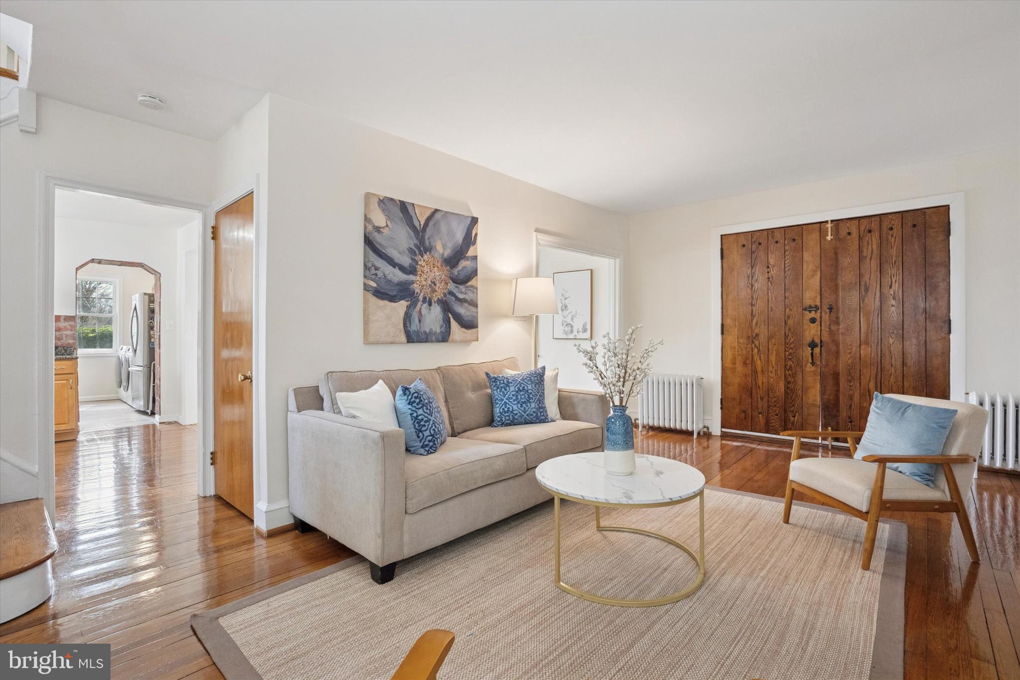228 Avon Road Narberth, PA 19072 - Photo 6 of 24 a living room with furniture and a wooden floor