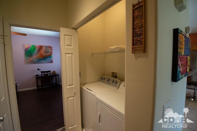 82320 Lancaster Way Indio, CA 92201 - Photo 14 of 27 a room with storage and utility