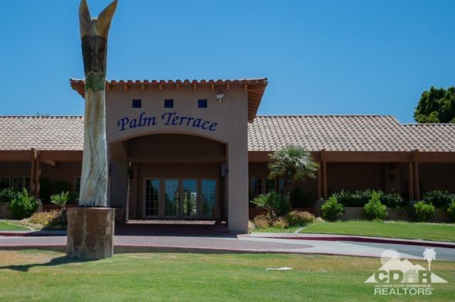 82320 Lancaster Way Indio, CA 92201 - Photo 17 of 27 a front view of a house with a yard