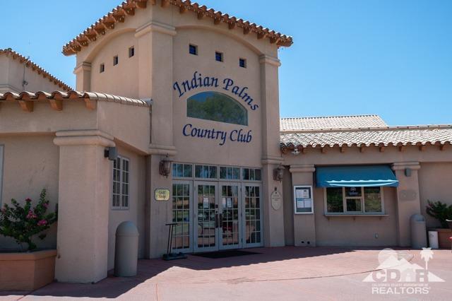 82320 Lancaster Way Indio, CA 92201 - Photo 20 of 27 a front view of a building with entryway