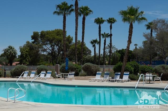 82320 Lancaster Way Indio, CA 92201 - Photo 24 of 27 a view of a swimming pool with chairs